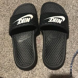 Black Nike slides
